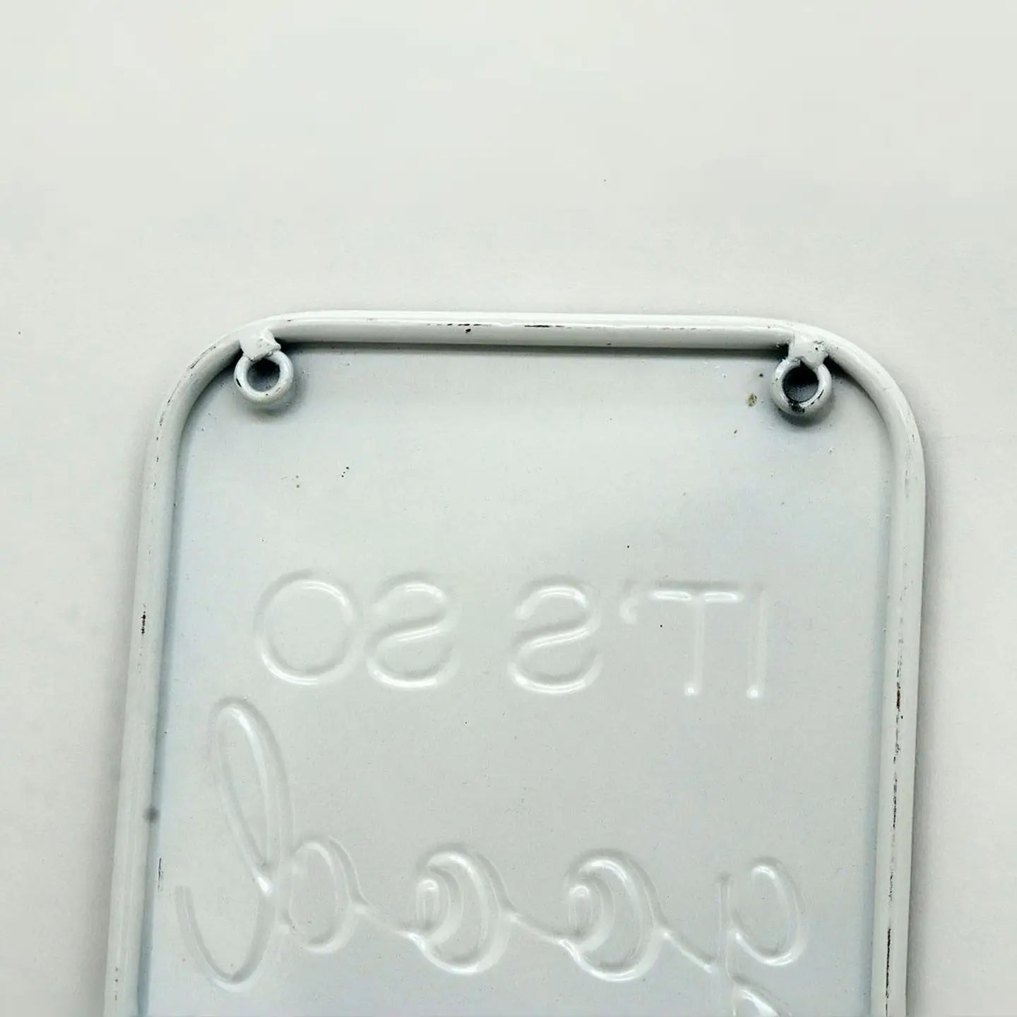 It's So Good To Be Home Embossed Metal Wall Sign - STV