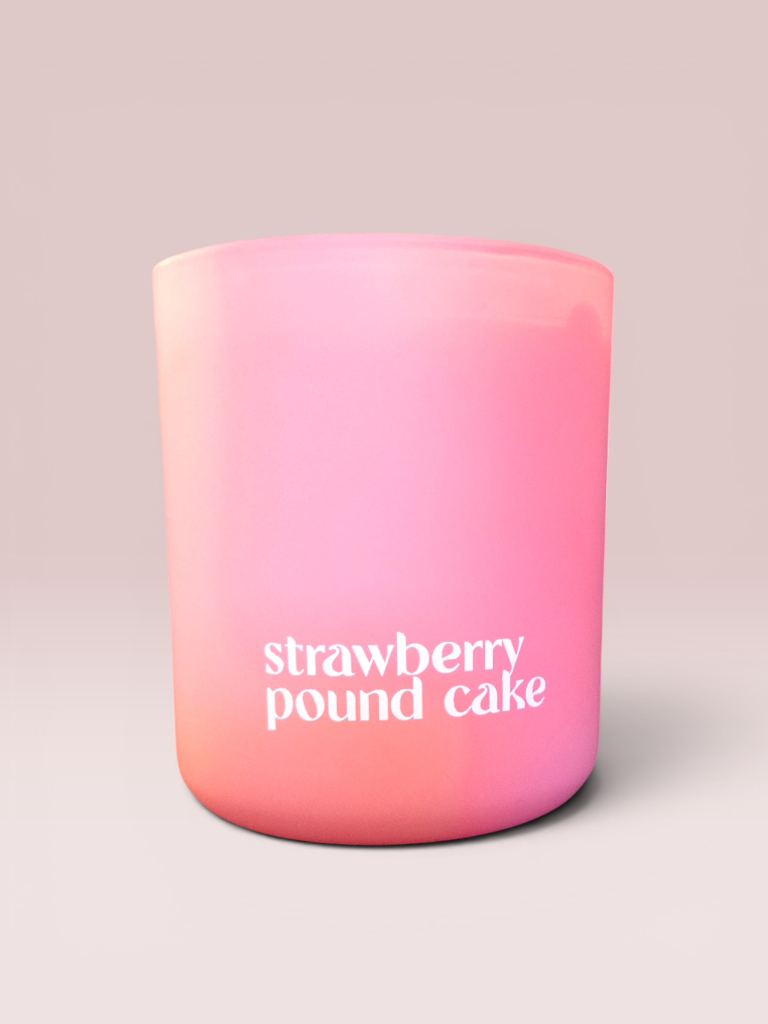 Strawberry Pound Cake 9 oz double-wick candle in a matte pink glass vessel.