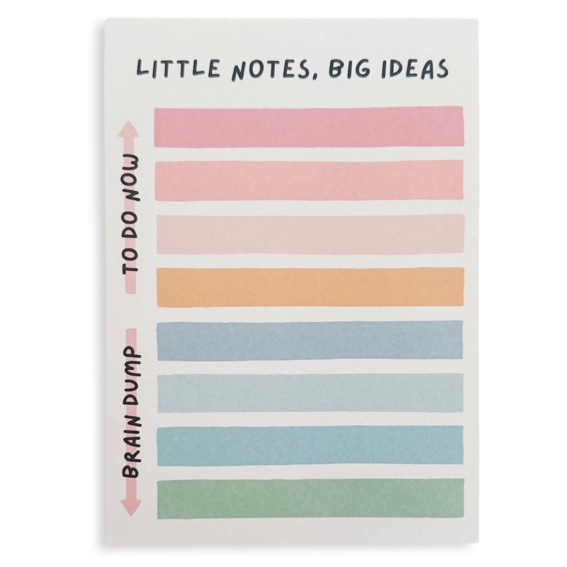 Notebook with colorful striped pages and text on a white background