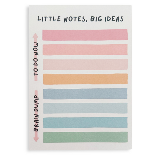 Notebook with colorful striped pages and text on a white background