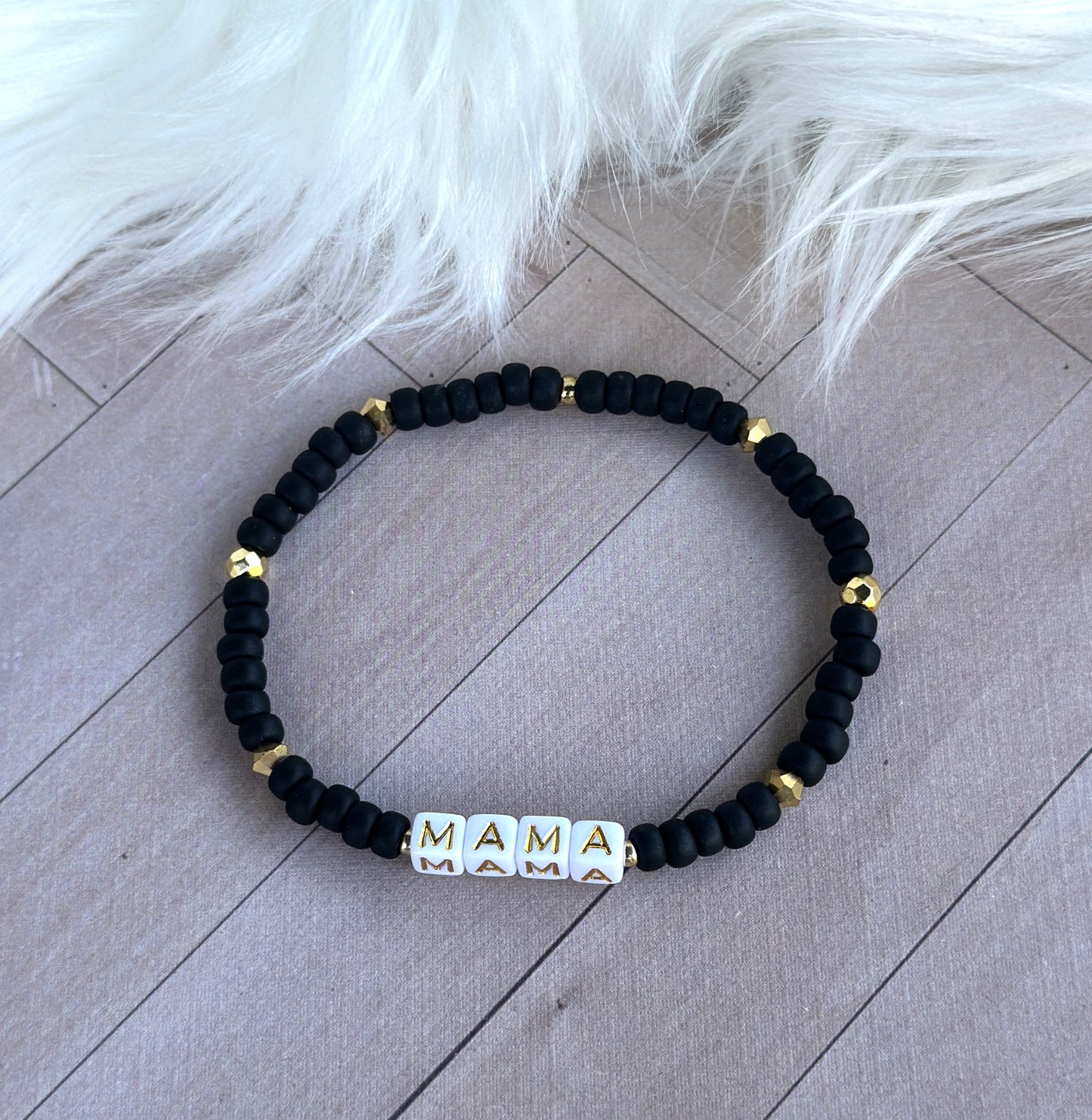 Blk/Gld Wrd Brclt- Loocid Dreams
